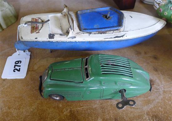 Schuco clockwork car and a boat